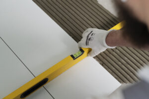 tiler working renovation apartment